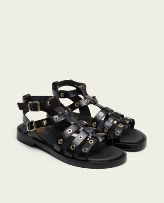 SANDALIA ROMANA PLANA PIEL CON TACHUELAS NEGRO MIA