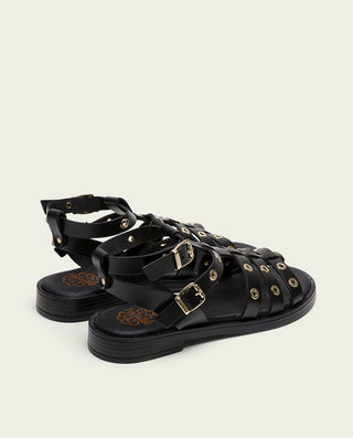 SANDALIA ROMANA PLANA PIEL CON TACHUELAS NEGRO MIA