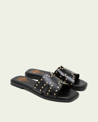 Sandalia plana de piel con tachuelas Becca negro