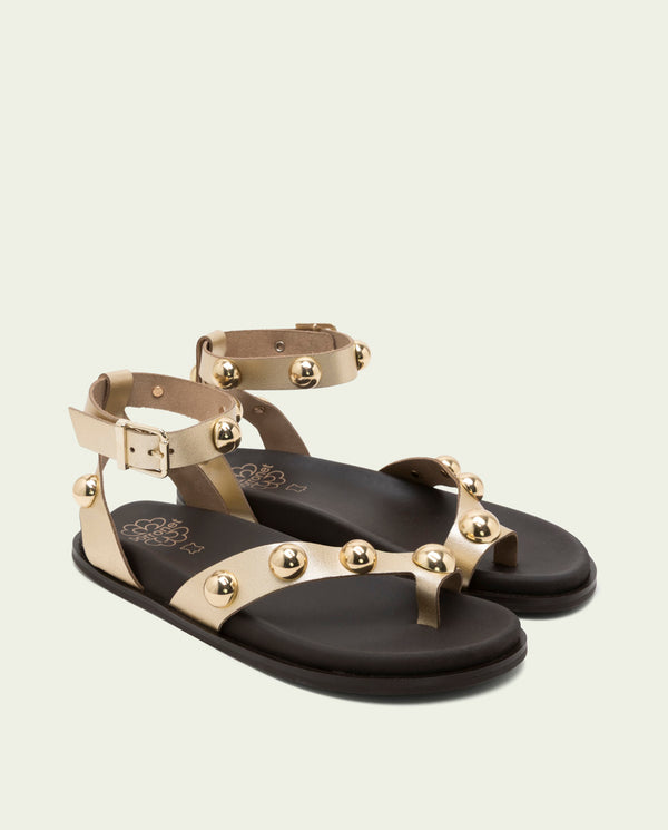 Sandalia plana de piel tachuelas Holly oro